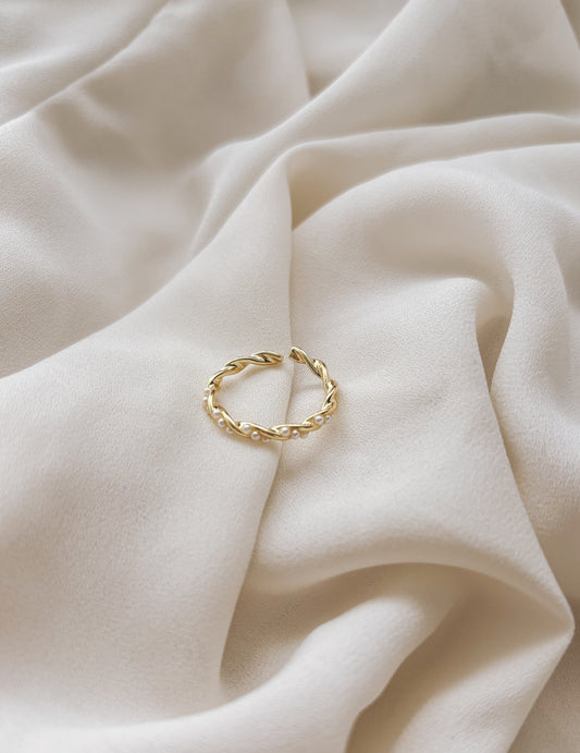 The "Intertwined" Ring